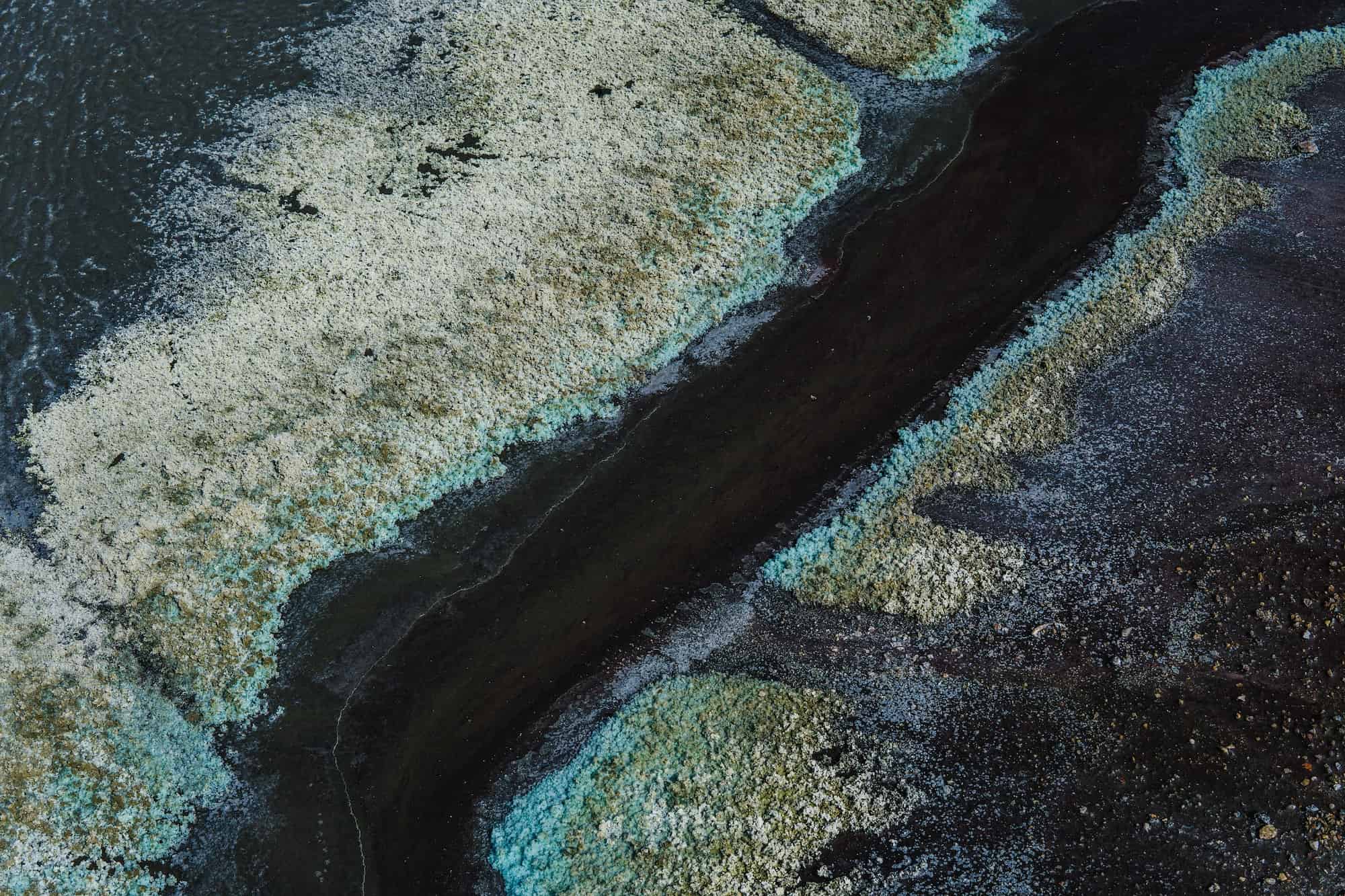 Polluted water with copper sulphate at the sides in Rio Tinto mining park